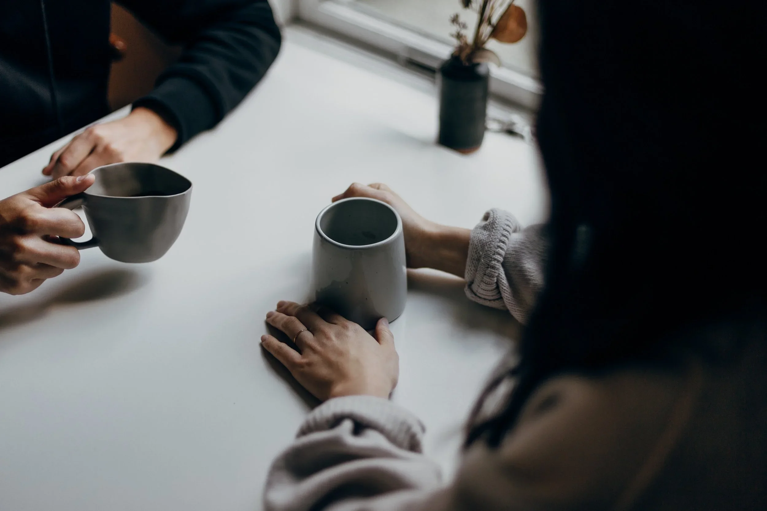 Residents sharing coffee at Hallmark Station